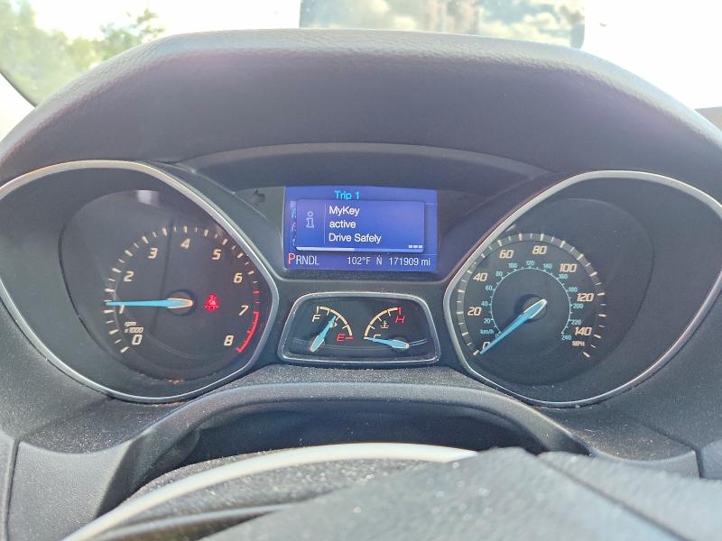 Photo 9 from auction – 2013 FORD FOCUS with VIN 1FADP3F24DL144720