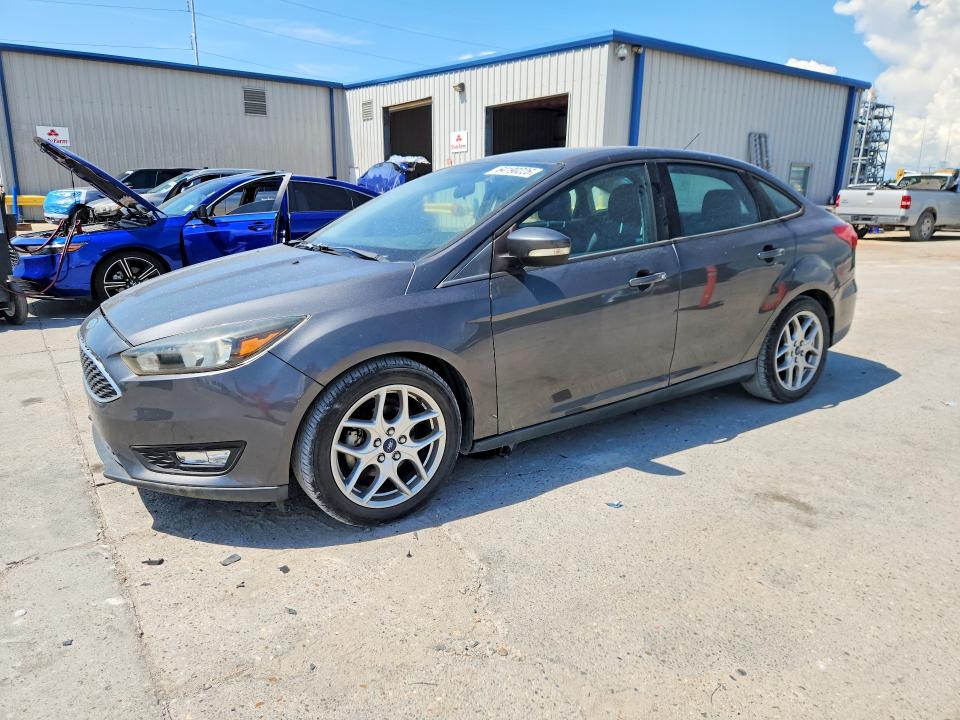 FORD FOCUS 2015 with VIN 1FADP3F27FL230400 - Photo from auction