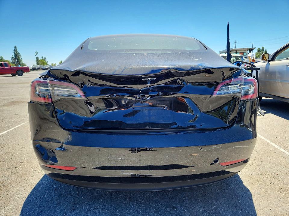 Снимка 6 от търг – 2022 TESLA MODEL 3 с VIN 5YJ3E1EA3NF124732