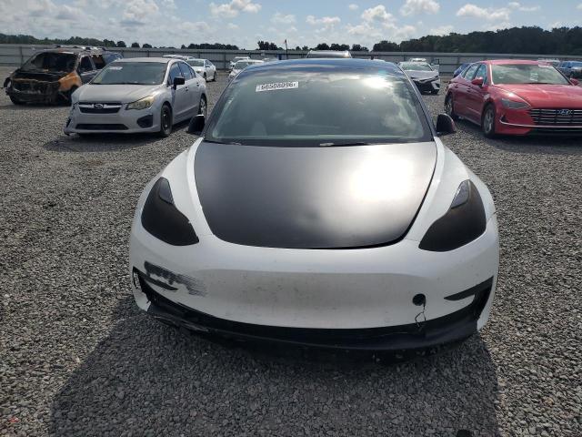 Photo 5 from auction – 2022 TESLA MODEL 3 with VIN 5YJ3E1EB0NF105838