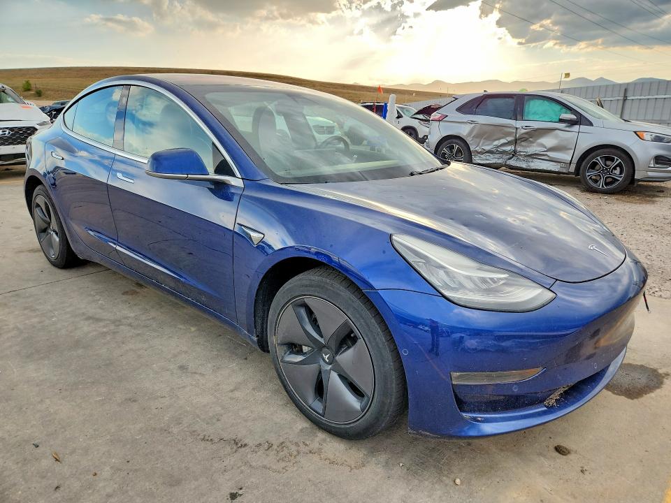 Photo 4 from auction – 2018 TESLA MODEL 3 with VIN 5YJ3E1EB1JF064419