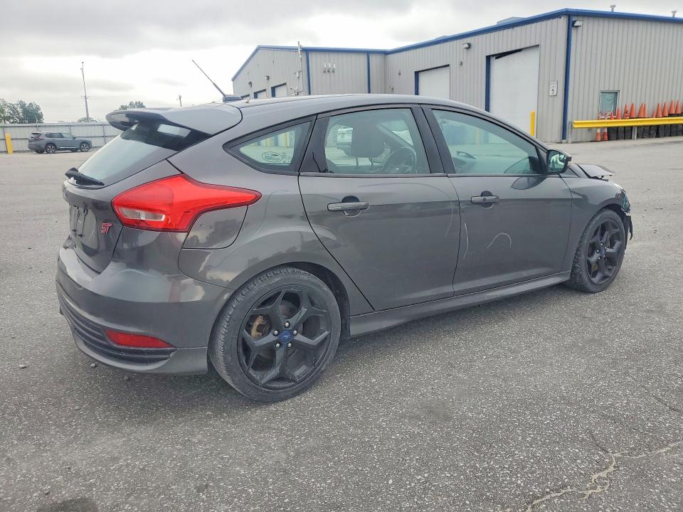 Снимка 3 от търг – 2016 FORD FOCUS с VIN 1FADP3L95GL350506