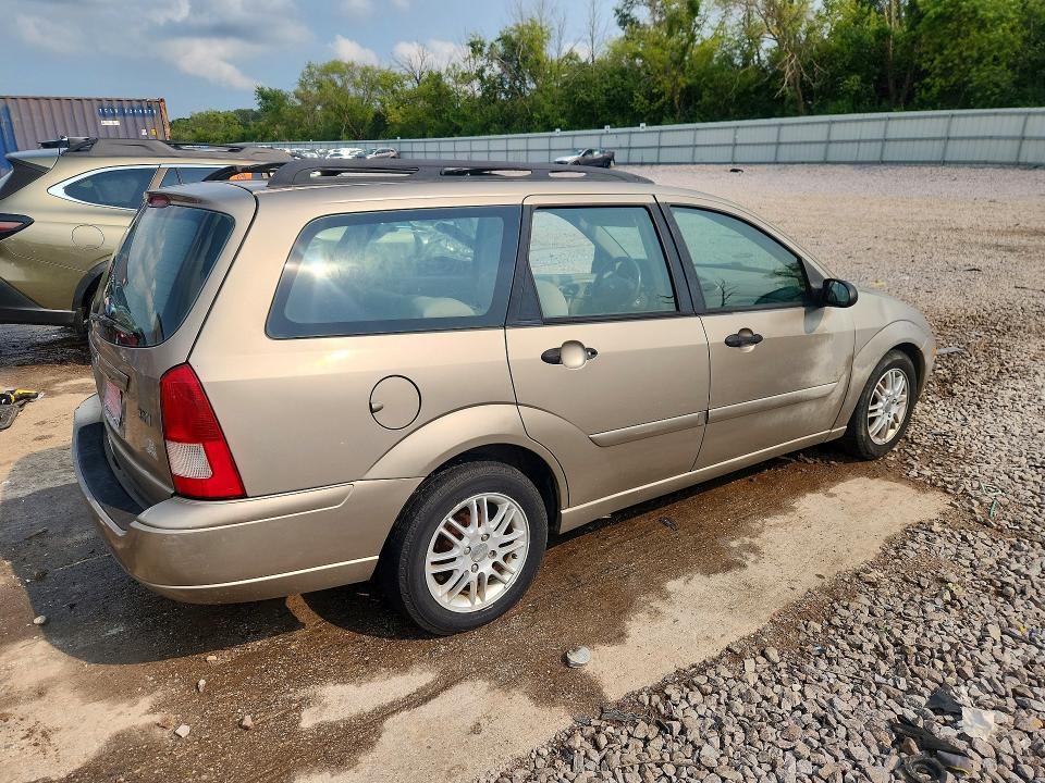 Photo 3 from auction – 2003 FORD FOCUS with VIN 1FAHP36393W340000