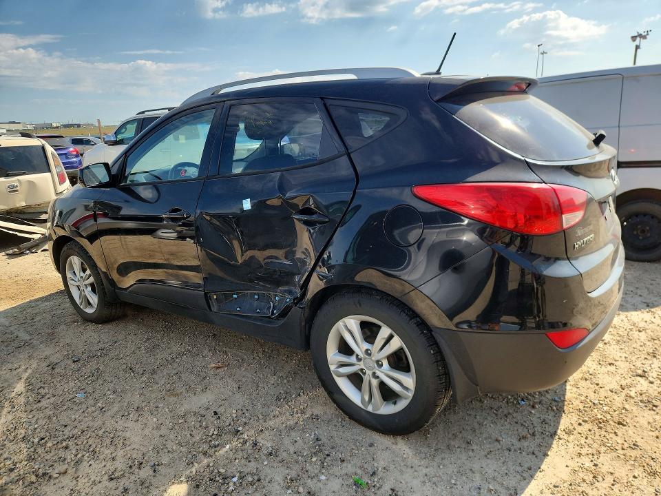Photo 2 from auction – 2011 HYUNDAI TUCSON with VIN KM8JUCAC0BU178713
