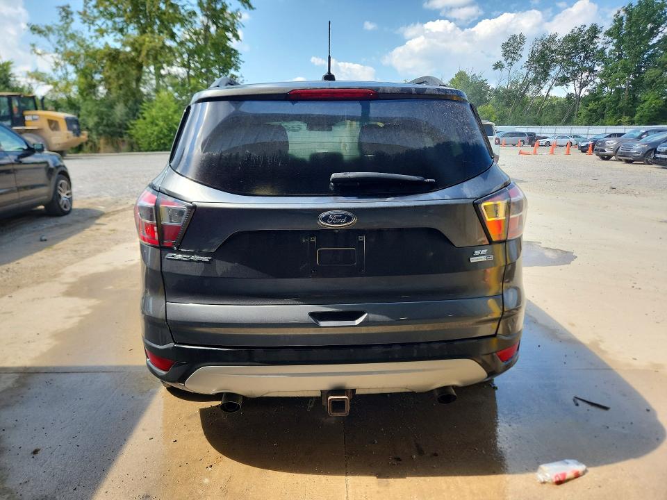 Photo 6 from auction – 2018 FORD ESCAPE with VIN 1FMCU9GD7JUC28744
