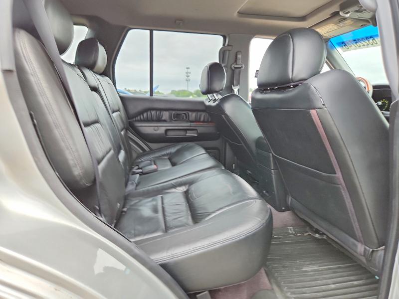 Photo 11 from auction – 2003 INFINITI QX4 with VIN JNRDR09Y13W300812