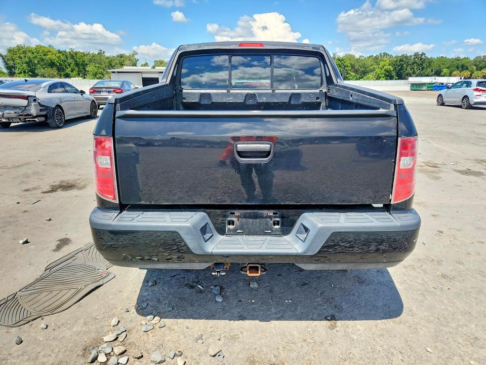 Photo 6 from auction – 2011 HONDA RIDGELINE with VIN 5FPYK1F26BB003704