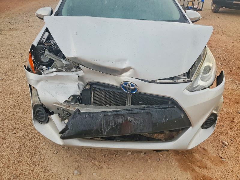 Photo 11 from auction – 2015 TOYOTA PRIUS C with VIN JTDKDTB39F1581183