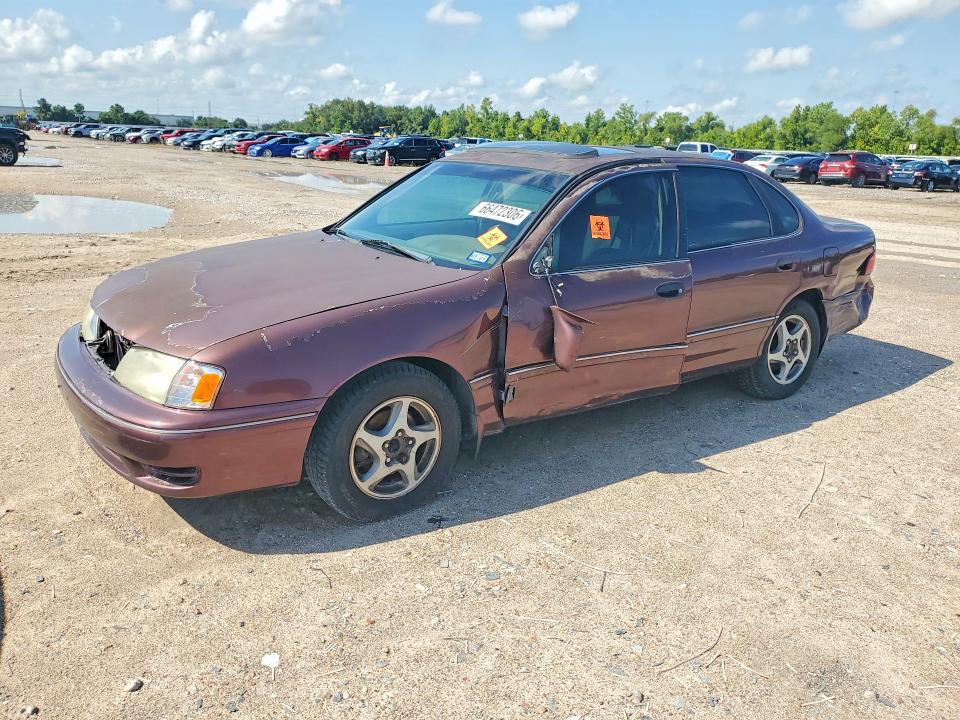 TOYOTA AVALON 1999 with VIN 4T1BF18B8XU322399 - Photo from auction