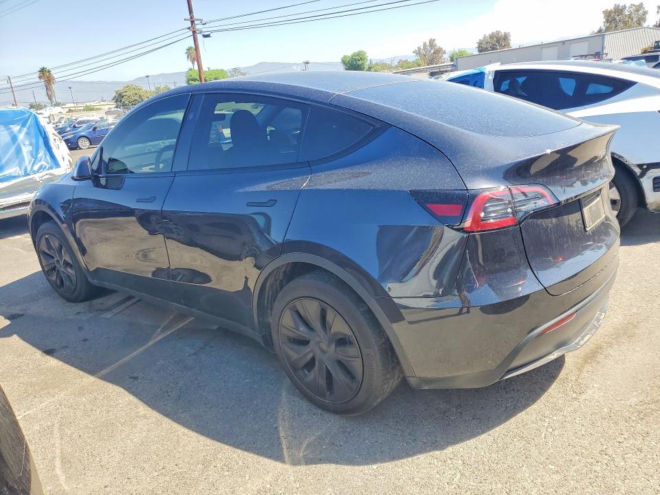 Photo 2 from auction – 2025 TESLA MODEL Y with VIN 7SAYGDED7SF319596