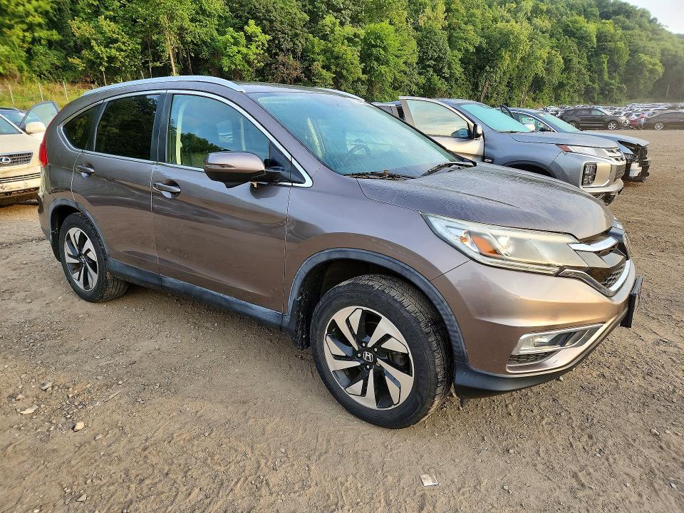 Photo 4 from auction – 2015 HONDA CR-V with VIN 5J6RM4H96FL009700
