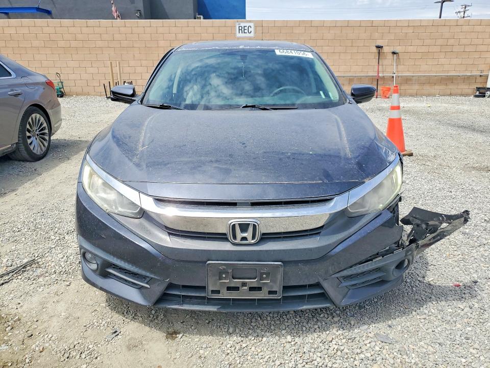 Photo 5 from auction – 2017 HONDA CIVIC with VIN 2HGFC1F33HH642827