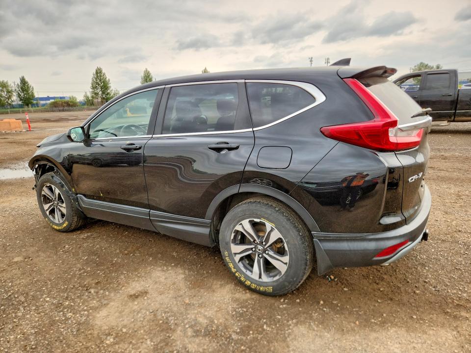 Photo 2 from auction – 2018 HONDA CR-V with VIN 2HKRW2H27JH143930