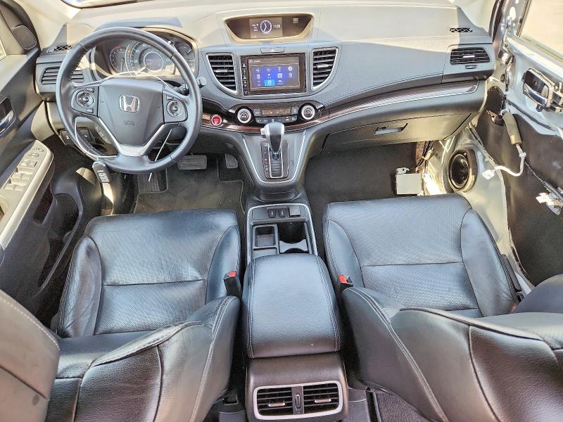 Photo 8 from auction – 2015 HONDA CR-V with VIN 2HKRM3H77FH518987