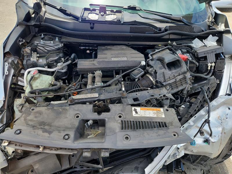 Photo 11 from auction – 2018 HONDA CR-V with VIN 5J6RW1H53JA001807
