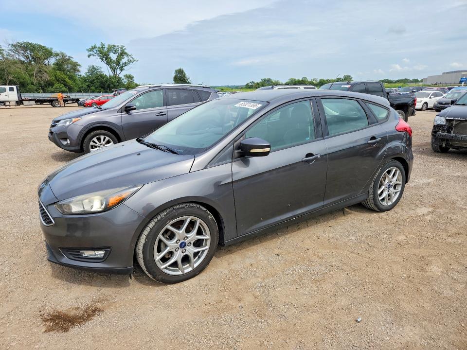 FORD FOCUS 2015 with VIN 1FADP3K26FL386885 - Photo from auction