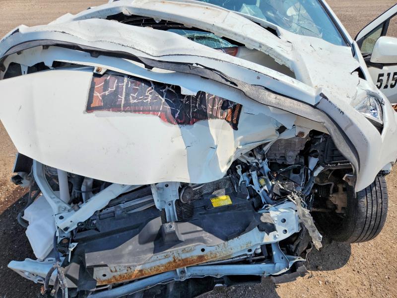 Photo 11 from auction – 2014 TOYOTA PRIUS C with VIN JTDKDTB35E1069578