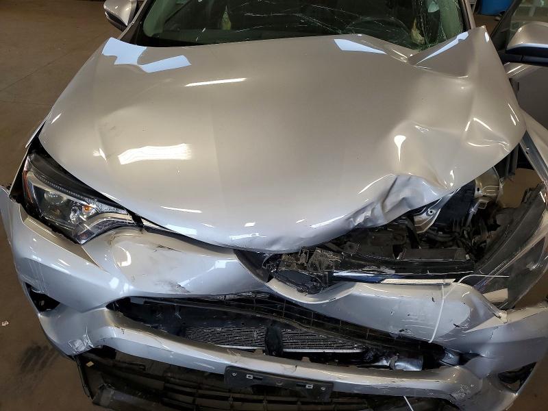 Photo 11 from auction – 2017 TOYOTA RAV4 with VIN 2T3RFREV7HW542377