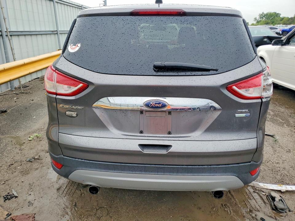 Photo 6 from auction – 2013 FORD ESCAPE with VIN 1FMCU9H97DUC95052