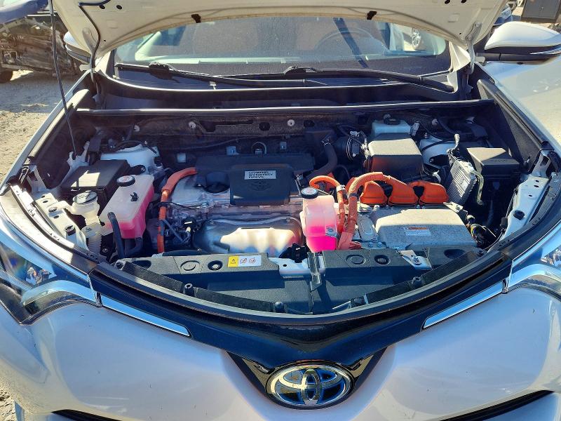 Photo 12 from auction – 2018 TOYOTA RAV4 HV with VIN JTMDJREV4JD185462