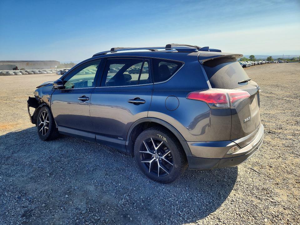 Photo 2 from auction – 2018 TOYOTA RAV4 HV with VIN JTMJJREV4JD163528