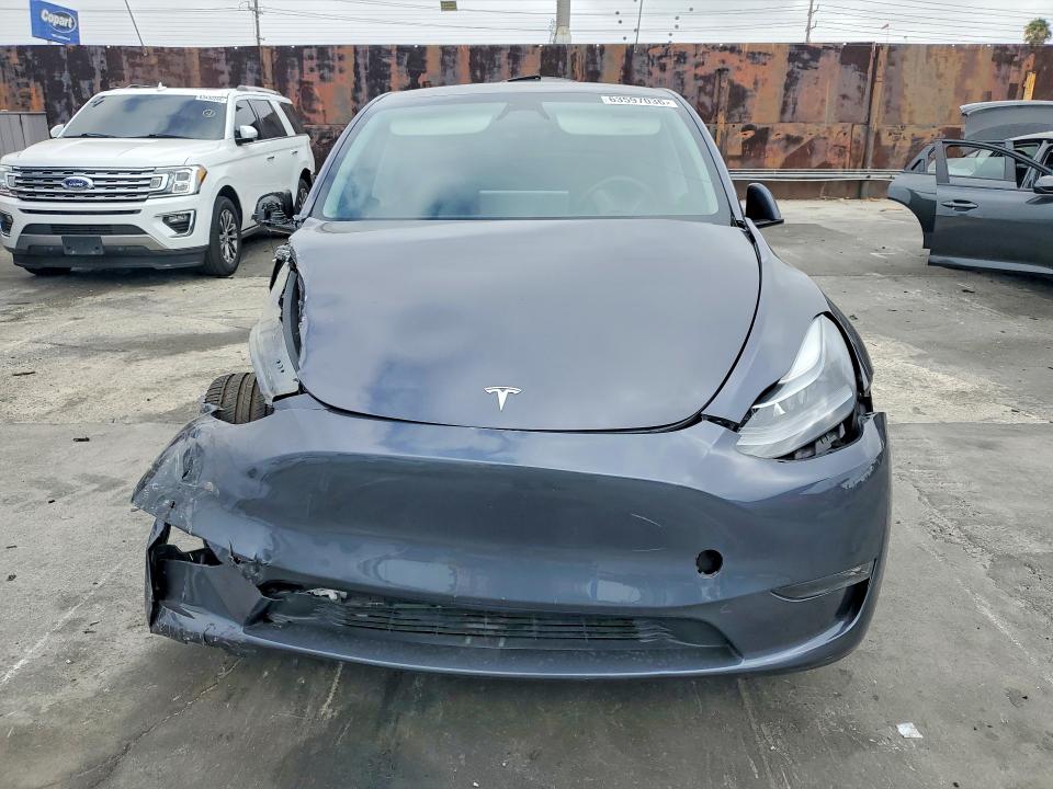 Photo 5 from auction – 2023 TESLA MODEL Y with VIN 7SAYGDEE6PF889931