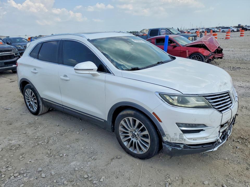 Photo 4 from auction – 2015 LINCOLN MKC with VIN 5LMTJ2AH8FUJ03848