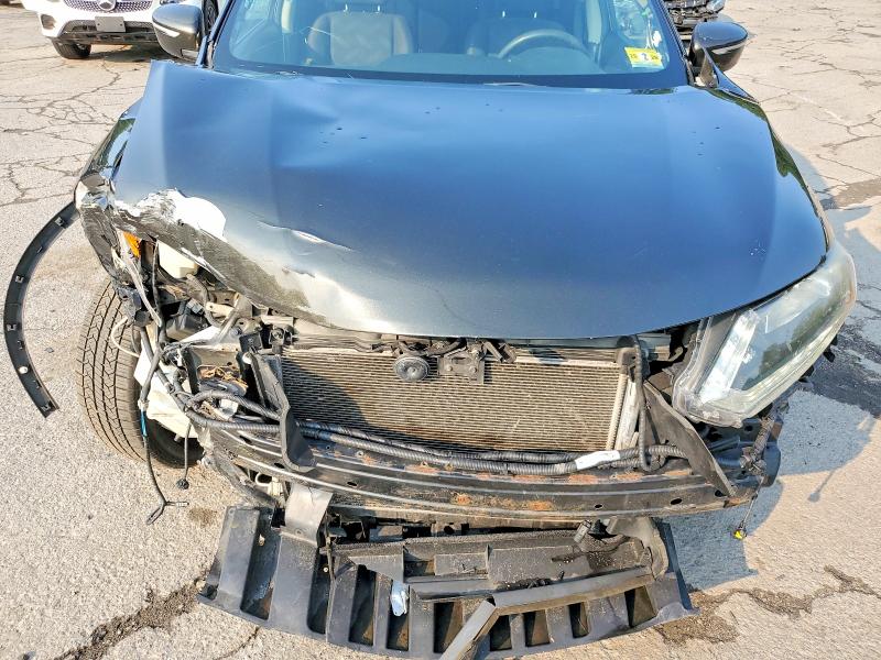 Photo 12 from auction – 2015 NISSAN ROGUE with VIN KNMAT2MV0FP521863