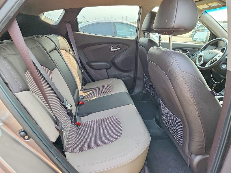 Photo 10 from auction – 2013 HYUNDAI TUCSON with VIN KM8JUCAC1DU617002