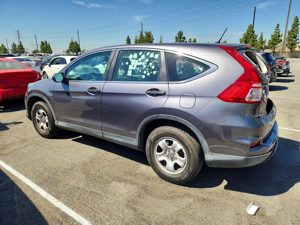 Photo 2 from auction – 2015 HONDA CR-V with VIN 2HKRM3H35FH504700