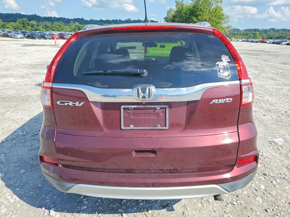 Photo 6 from auction – 2015 HONDA CR-V with VIN 2HKRM4H77FH606038