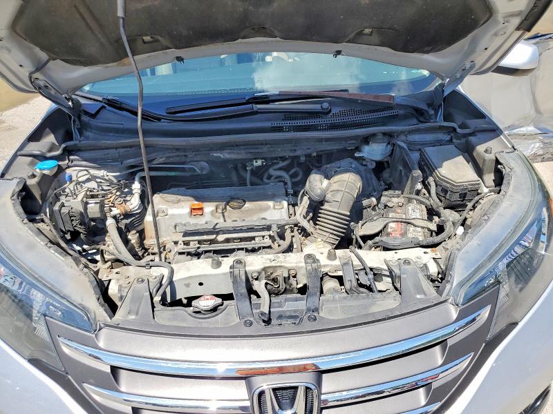 Photo 12 from auction – 2014 HONDA CR-V with VIN 2HKRM4H72EH631699