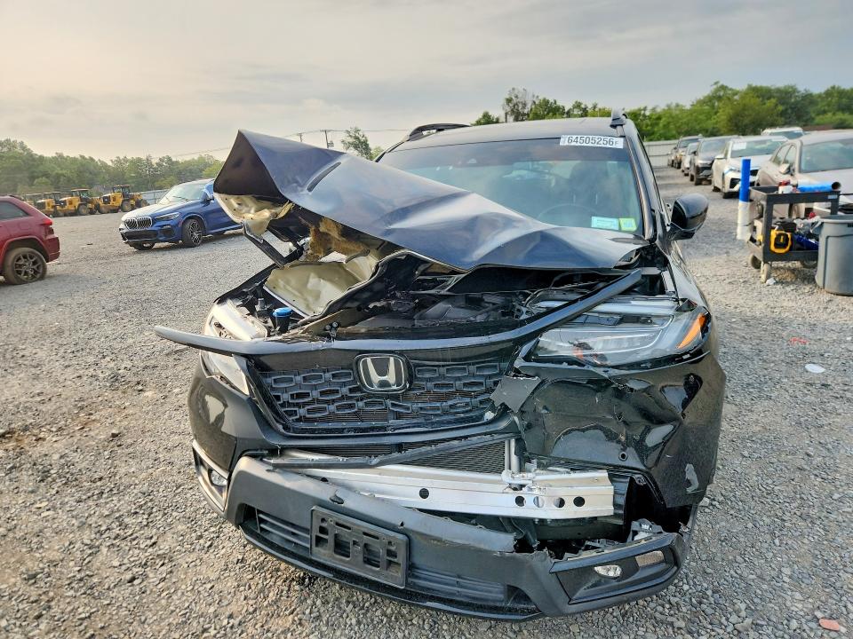 Photo 5 from auction – 2021 HONDA PASSPORT with VIN 5FNYF8H05MB010065
