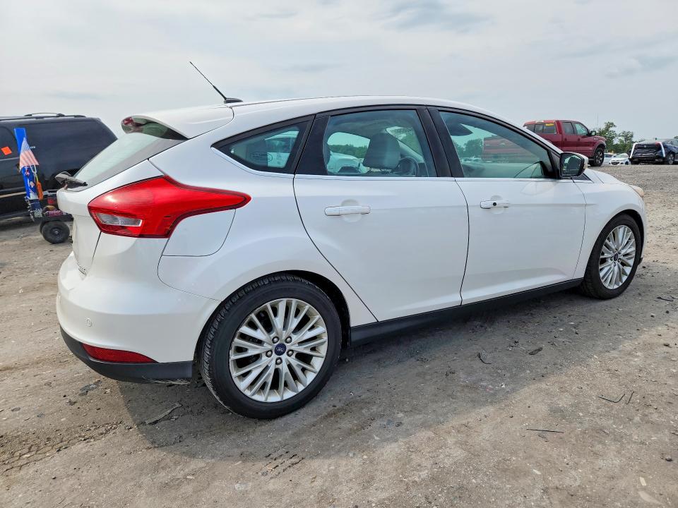 Photo 3 from auction – 2015 FORD FOCUS with VIN 1FADP3N23FL228547