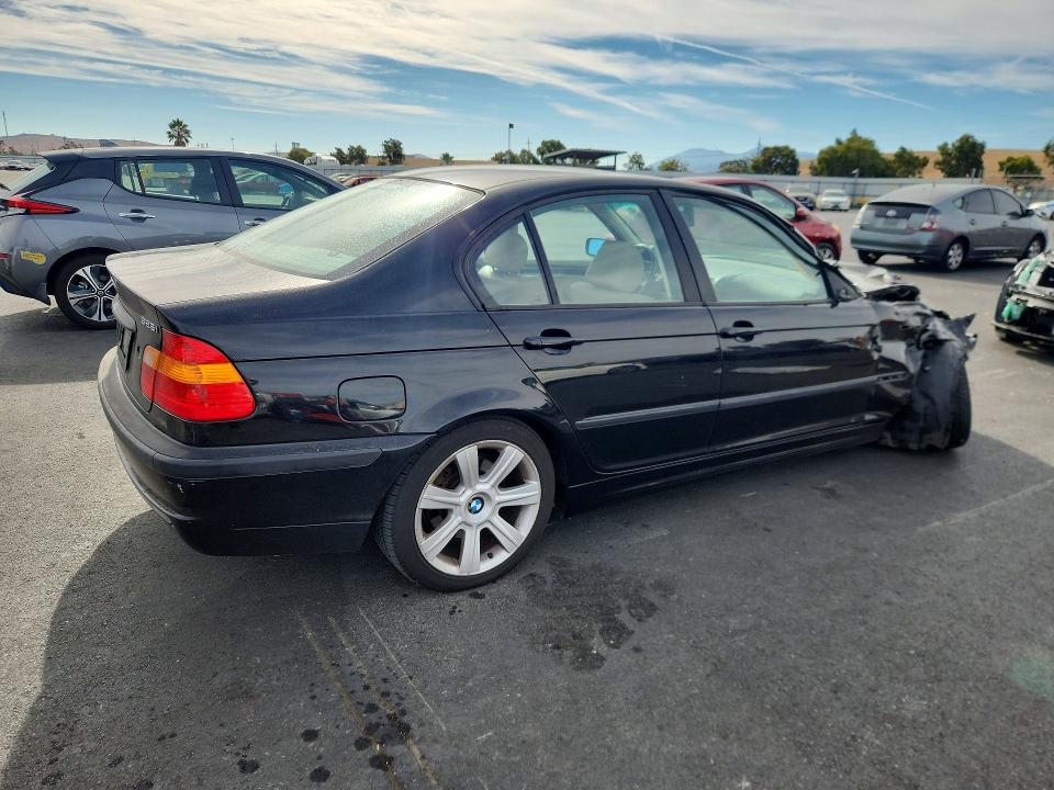 Photo 3 from auction – 2002 BMW 325 with VIN WBAEV33482KL76862