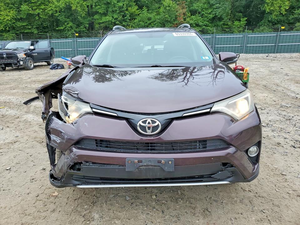 Photo 5 from auction – 2016 TOYOTA RAV4 with VIN 2T3RFREV1GW500852
