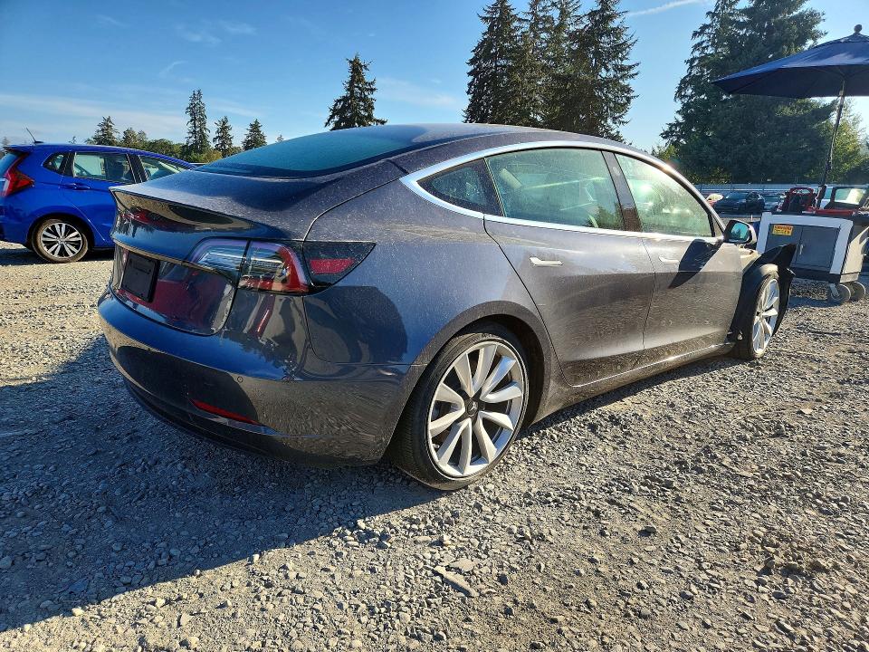 Photo 3 from auction – 2020 TESLA MODEL 3 with VIN 5YJ3E1EA3LF614102