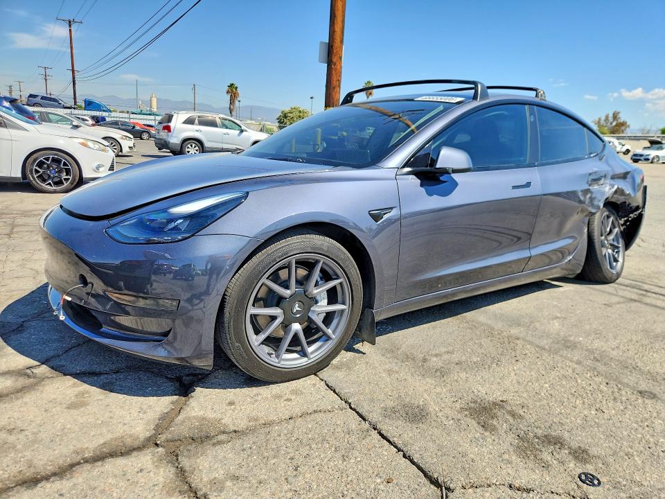 TESLA MODEL 3 2023 с VIN 5YJ3E1EA3PF691753 - Снимка от търг