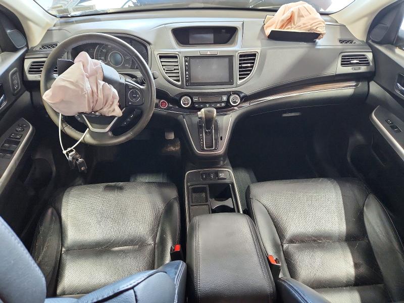Photo 8 from auction – 2015 HONDA CR-V with VIN 5J6RM4H92FL005045