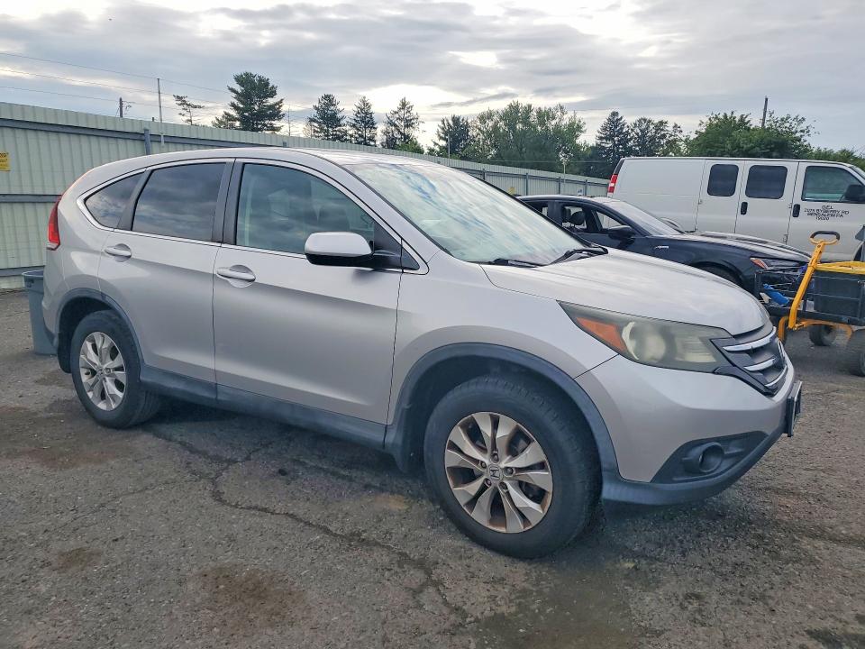 Photo 4 from auction – 2013 HONDA CR-V with VIN 3CZRM3H50DG702540