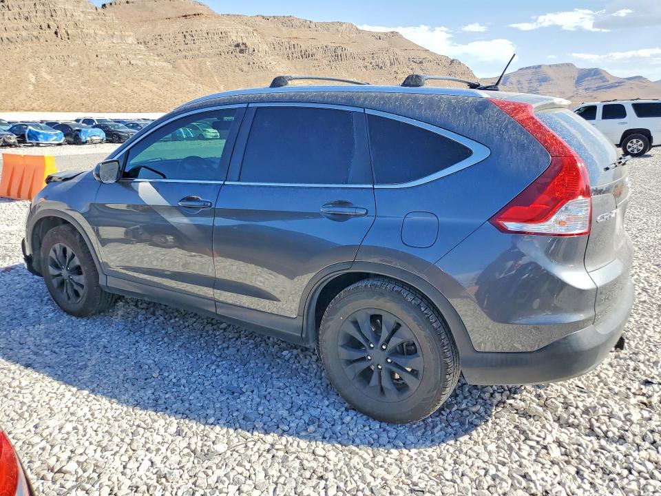 Photo 2 from auction – 2014 HONDA CR-V with VIN 2HKRM3H77EH505090