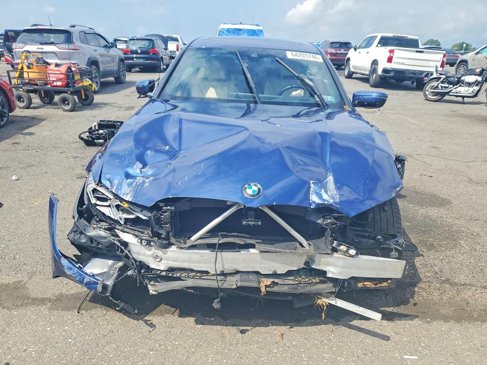 Photo 5 from auction – 2023 BMW 330XI with VIN 3MW89FF06P8D78274