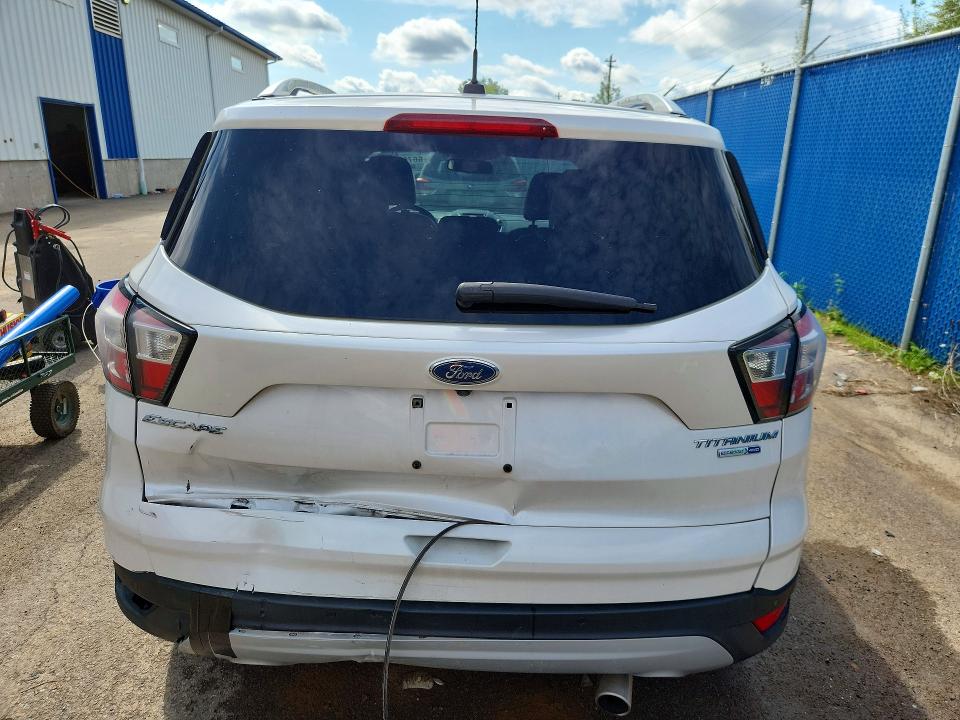 Photo 6 from auction – 2017 FORD ESCAPE with VIN 1FMCU9J98HUC39959