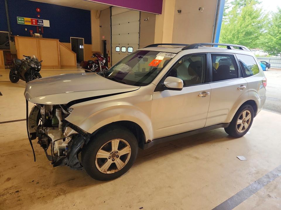SUBARU FORESTER 2009 with VIN JF2SH636X9H725559 - Photo from auction