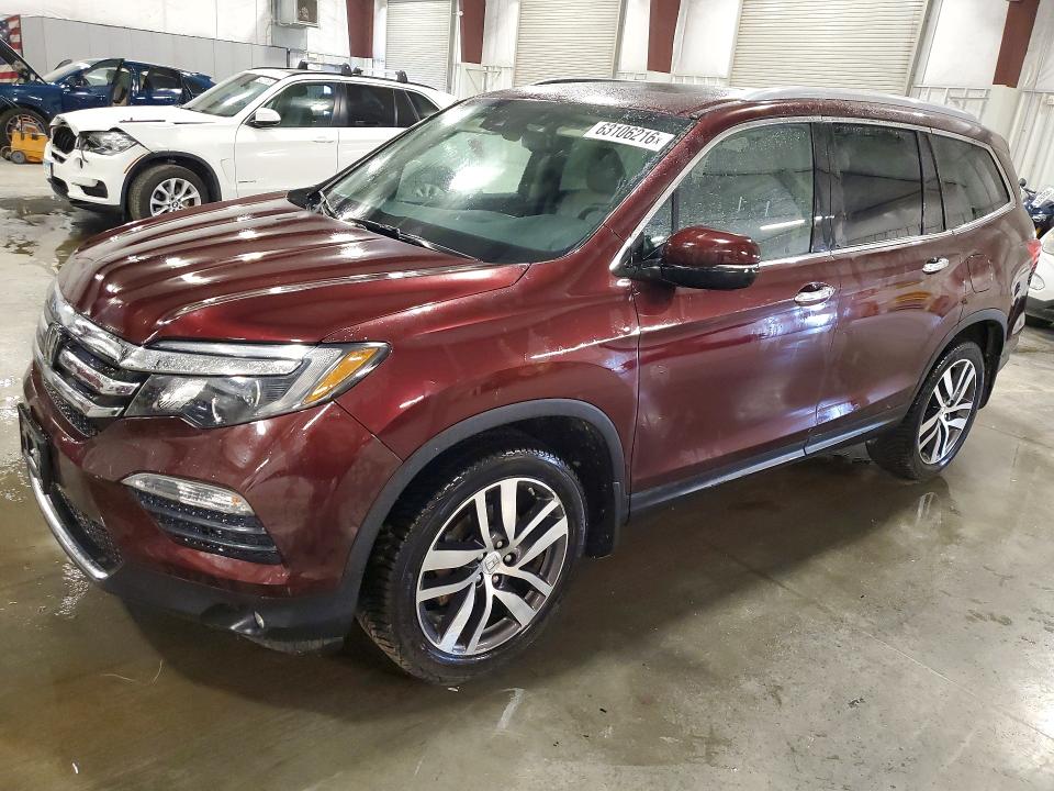 HONDA PILOT 2017 with VIN 5FNYF6H01HB006931 - Photo from auction