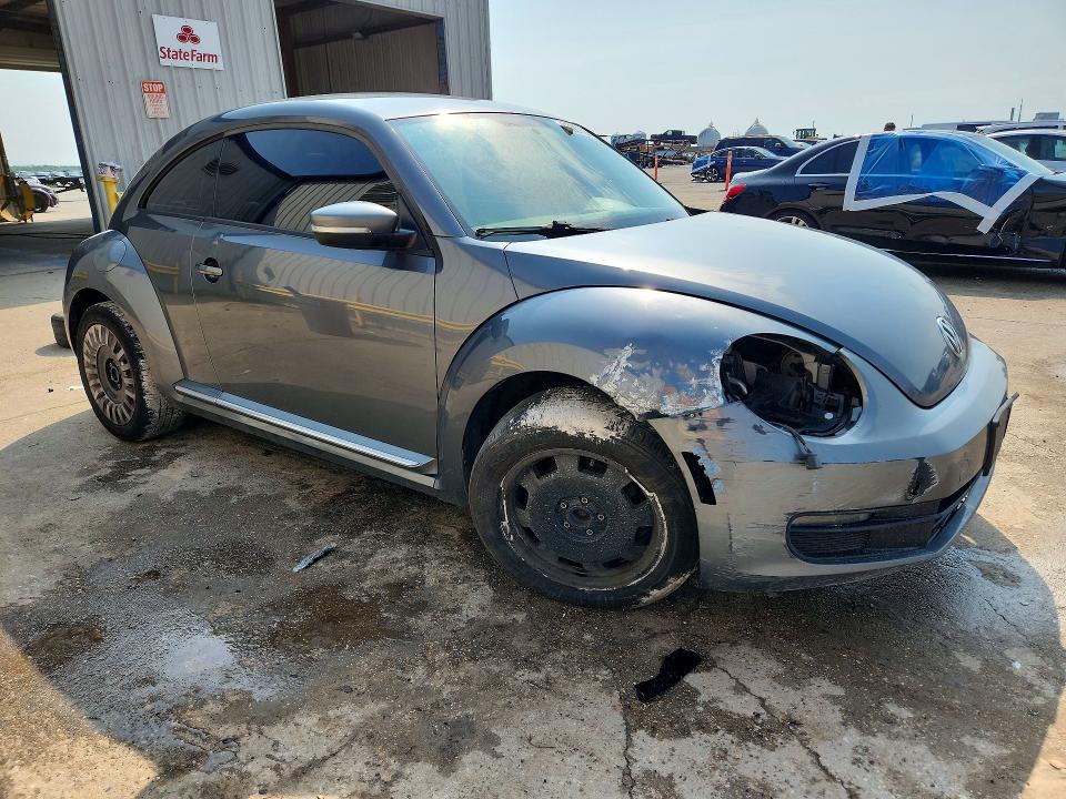Photo 4 from auction – 2013 VOLKSWAGEN BEETLE with VIN 3VWJX7AT6DM669231