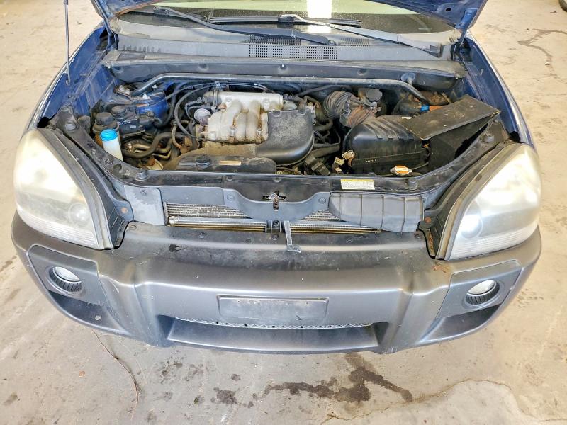 Photo 12 from auction – 2005 HYUNDAI TUCSON with VIN KM8JN72D45U064021
