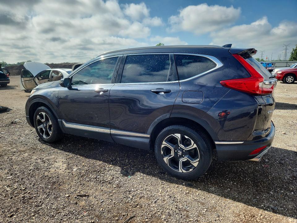 Photo 2 from auction – 2017 HONDA CR-V with VIN 5J6RW2H99HL047939