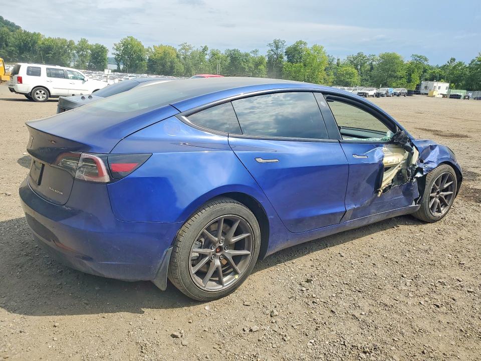 Photo 3 from auction – 2022 TESLA MODEL 3 with VIN 5YJ3E1EBXNF334995