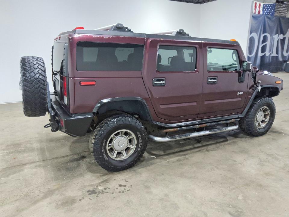 Photo 3 from auction – 2006 HUMMER H2 with VIN 5GRGN23U16H102006
